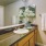 Large bathroom vanity with a large window