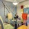 Large dining space with a painted accent wall