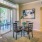 Dining space with a large glass slogan door opening to the patio